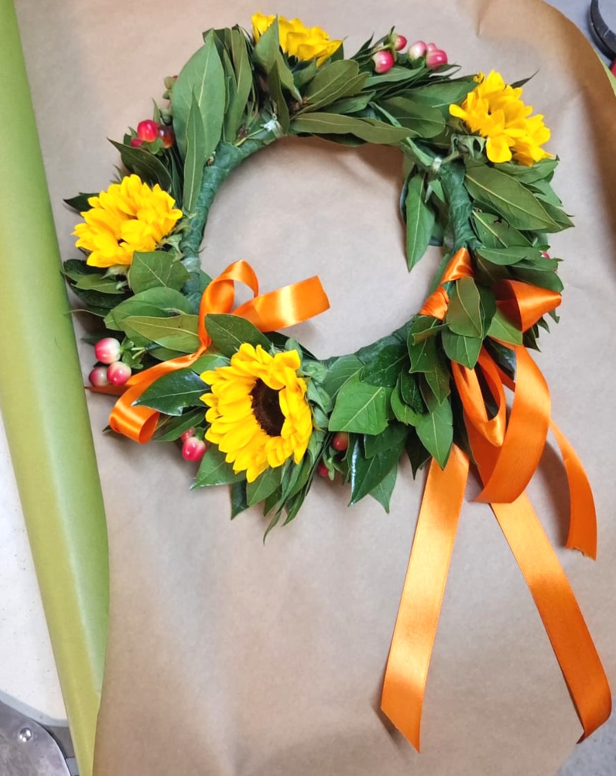 Coroncina di alloro e girasoli per Laurea. Consegniamo in giornata presso i principali Atenei e Università di Roma